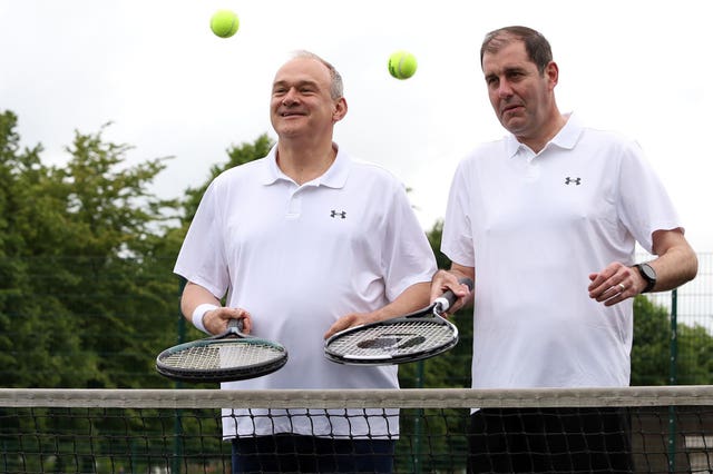 Lee Dillon (right), the Liberal Democrat MP for Newbury, pictured playing tennis in his constituency with his party's leader Sir Ed Davey