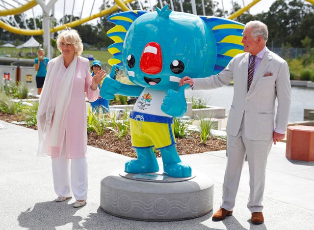 The Prince of Wales and Duchess of Cornwall with the games mascot Borobi during a visit to the Commonwealth Games athletes’ village in Gold Coast in 2018