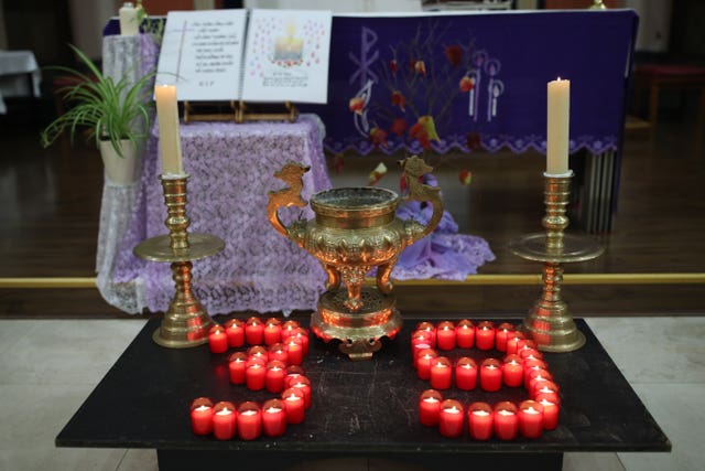 Candles laid out as part of a ceremony for the 39 victims