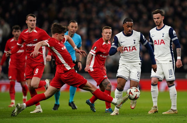 AZ Alkmaar’s Wouter Goes (left) tackles Tottenham Hotspur’s Wilson Odobert