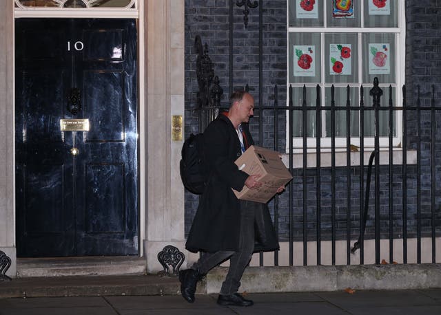 Dominic Cummings leaves 10 Downing Street, London, with a box (Yui Mok/PA)