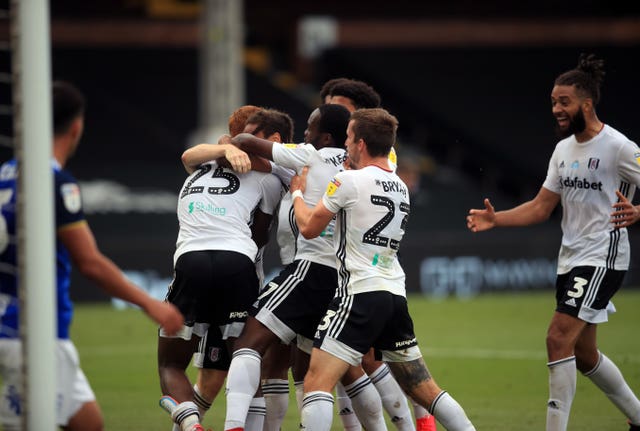Fulham’s Joshua Onomah is mobbed after his late winner 