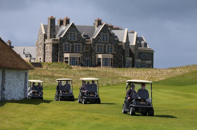 Golf buggies on the Doonbeg links