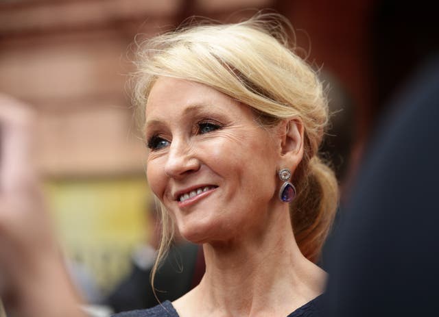 JK Rowling smiles at the Harry Potter And The Cursed Child opening gala