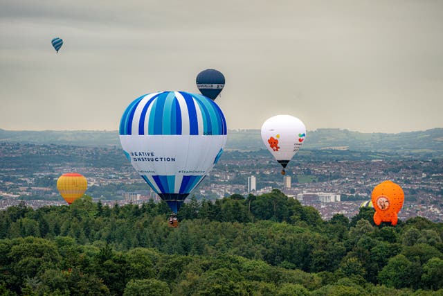 Hot air balloons float above north Somerset