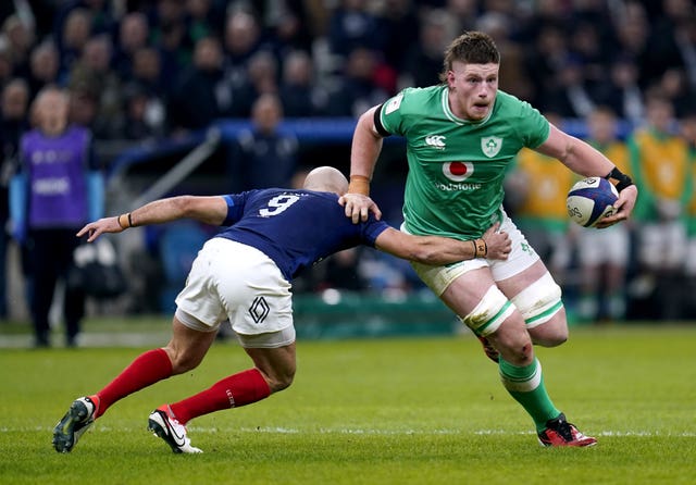 Ireland’s Joe McCarthy is tackled by France’s Maxime Lucu