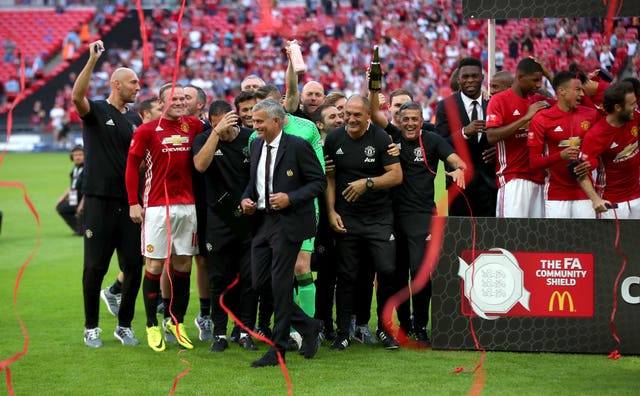 Mourinho celebrates with his players after beating Leicester to win the Community Shield at Wembley in August 2016 