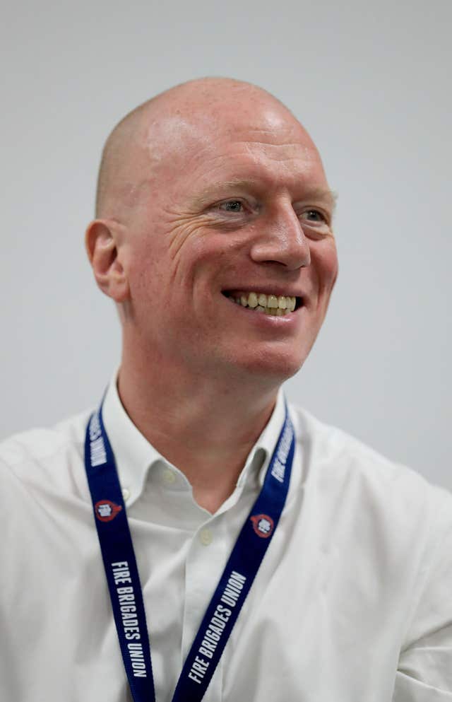 A close-up of a smiling Matt Wrack