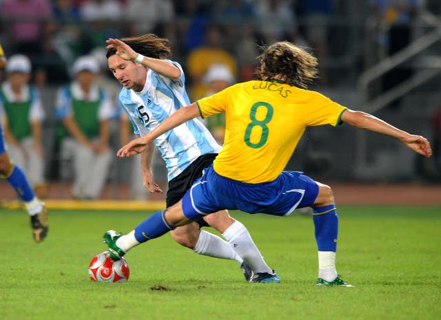 Lionel Messi, left, takes on Brazil's Lucas in the 2008 Olympic semi-final