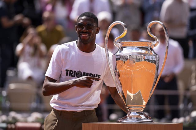 Paris St Germain's Ousmane Dembele with the Champions League trophy