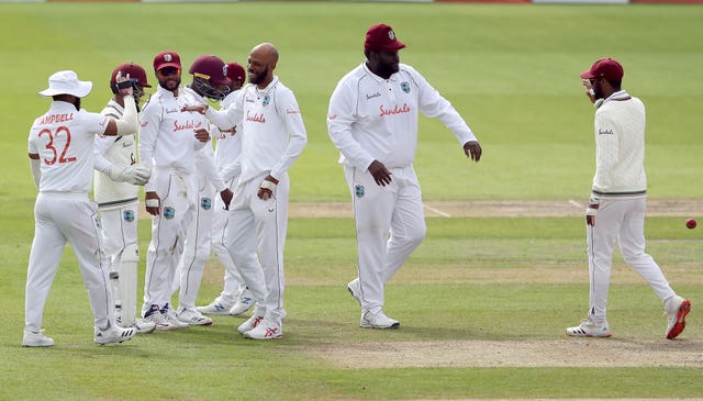 Rahkeem Cornwall (second right) took a superb catch to remove Burns