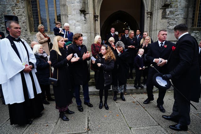 Mourners leave the funeral of Dennis Hutchings, who died after contracting Covid-19 while he was in Belfast to face trial over a fatal shooting incident in Co Tyrone in 1974, at St Andrew’s Church in Plymouth 