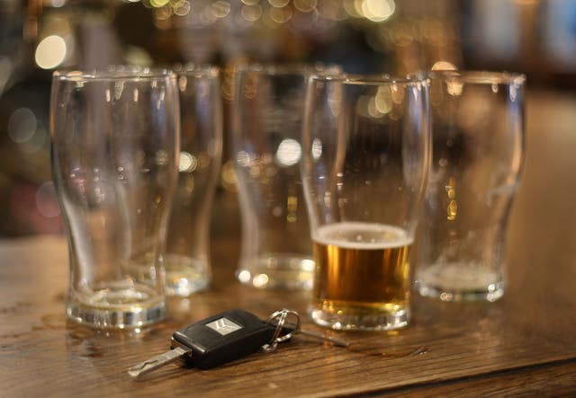 Beer glasses and a set of car keys (Philip Toscano/PA)