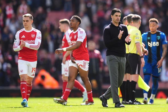 Arsenal&rsquo;s Leandro Trossard (left) and manage Mikel Arteta applaud the fans following defeat by Bournemouth
