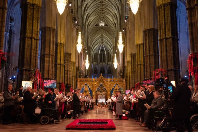 Members of the audience during the Together At Christmas carol service at Westminster Abbey in 2024