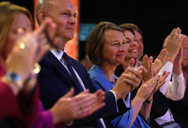 Sir Ed Davey’s wife Emily Gasson listening to her husband address the delegates 