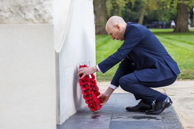 Defence Secretary John Healey laying a wreath at the Iraq and Afghanistan Memorial in London, to mark 10 years since the end of UK combat operations in Afghanistan