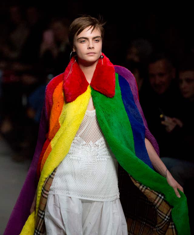Cara Delevingne on the catwalk during the Burberry show (Isabel Infantes/PA)