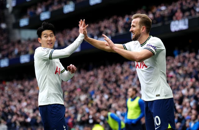 Kane and Son celebrating