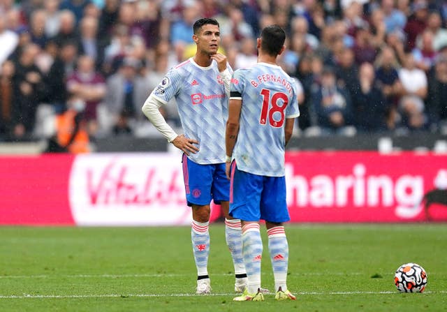 Manchester United’s Cristiano Ronaldo (left) and Bruno Fernandes looks dejected after West Ham United’s Said Benrahma scores their side’s first goal of the game during the Premier League match at the London Stadium, London. Picture date: Sunday September 19, 2021