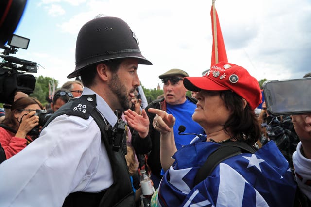 Police kept the peace in London among supporters of the president and protesters during Mr Trump's visit (Gareth Fuller/PA)