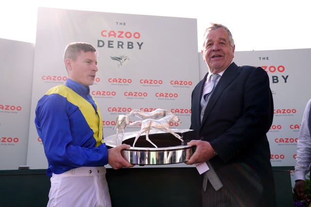 Trainer and jockey with the Derby trophy 