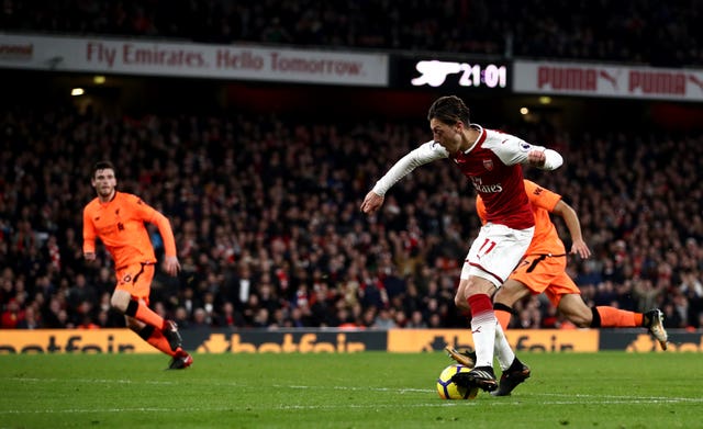 Ozil's unique finish saw him score past Liverpool goalkeeper Simon Mignolet during a thrilling draw in 2017.