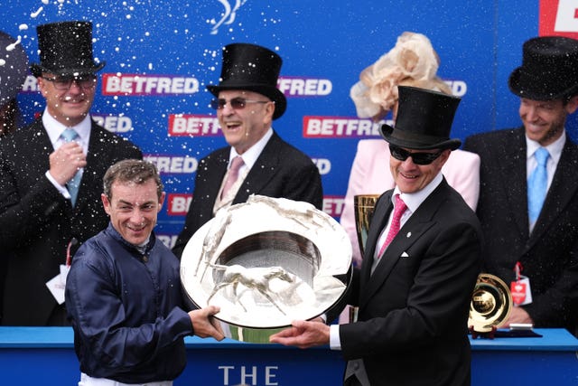 Wayne Lordan and Aidan O'Brien with the Betfred Derby trophy 
