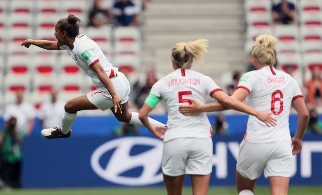 England's Nikita Parris celebrates scoring her penalty 