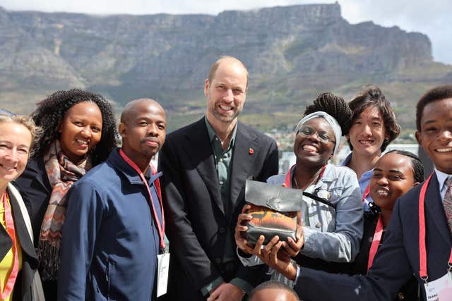 The Prince of Wales with a group of young people