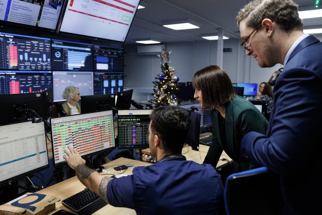 Chancellor of the Exchequer Rachel Reeves and Chief Secretary to the Treasury Darren Jones speak with staff in a hospital control centre