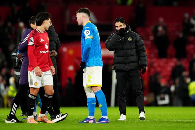 Manchester United manager Ruben Amorim, right, after the Premier League draw with Wolves