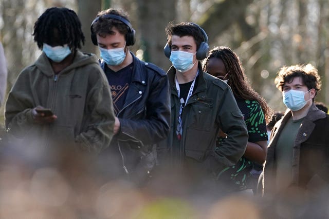Students in masks in a queue
