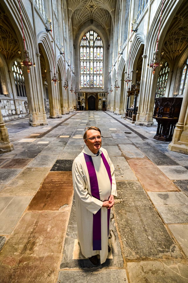 The Rector of Bath Abbey, Canon Guy Bridgewater, looks at the completed thermal heating works inside the famous Abbey (Ben Birchall/PA).