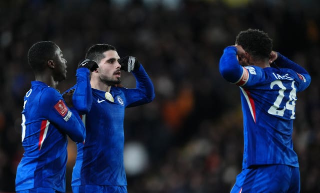 Chelsea’s Pedro Neto (centre) celebrates with team-mates Moises Caicedo (left) and Reece James