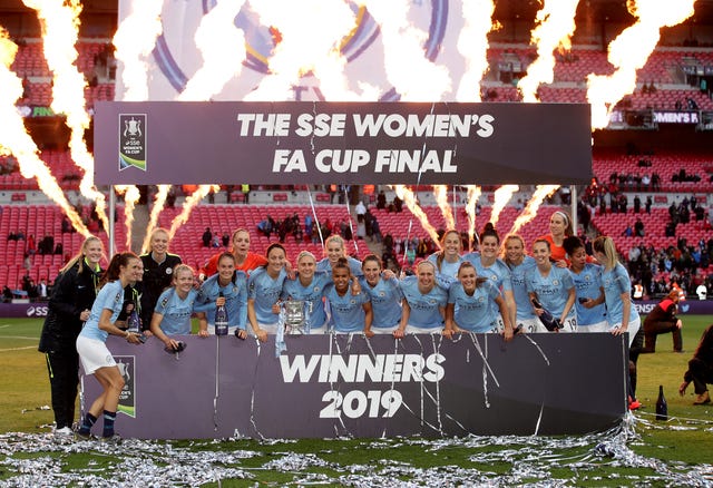 Manchester City Women celebrate with the trophy