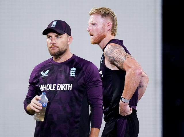 England coach Brendon McCullum, left, speaks to captain Ben Stokes during a nets session