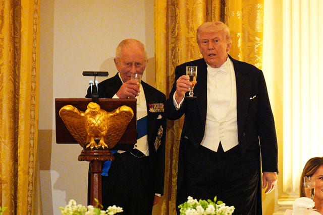 The King and President Donald Trump make a toast (Aaron Chown/PA)