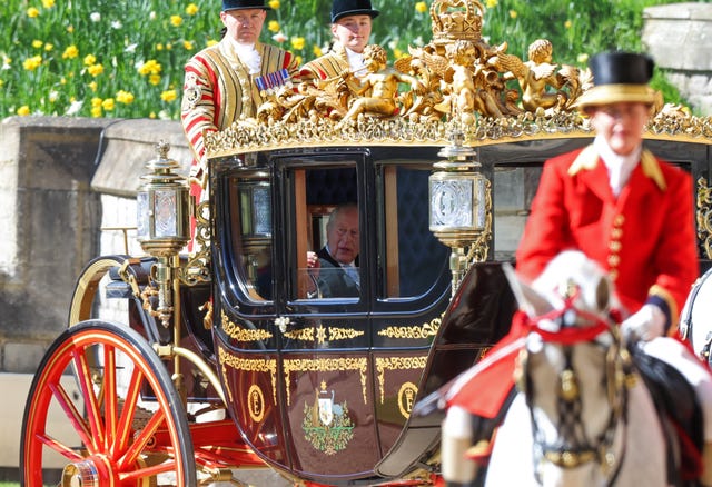 Charles and President of Nigeria Bola Ahmed Tinubu arrive in a carriage for the ceremonial welcome at Windsor Castle