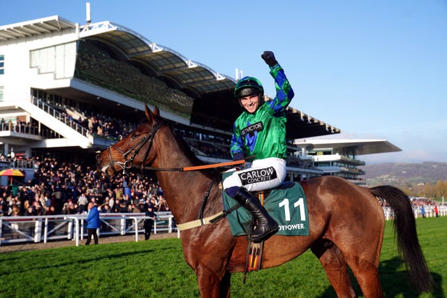 Ga Law and jockey Jonathan Burke after winning the Paddy Power Gold Cup at Cheltenham