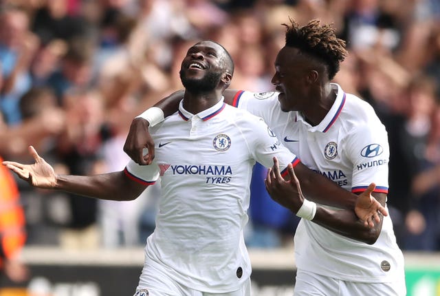 Abraham celebrates Chelsea's opener with goalscorer Fikayo Tomori
