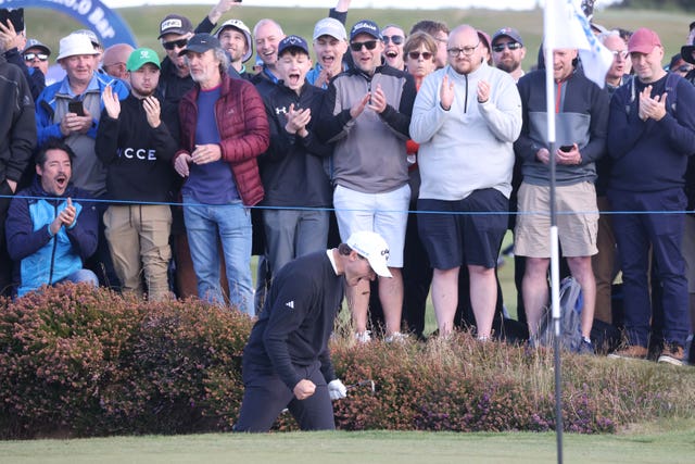 Rasmus Hojgaard celebrates a birdie on the 17th