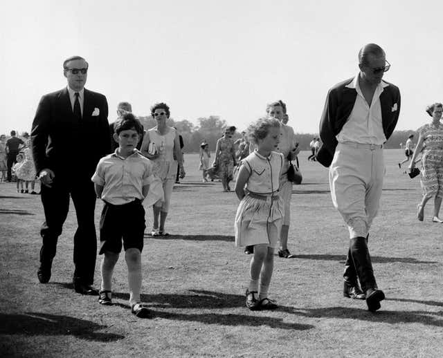Anne with her brother Charles and the Duke of Edinburgh at a polo match in 1957 (PA)