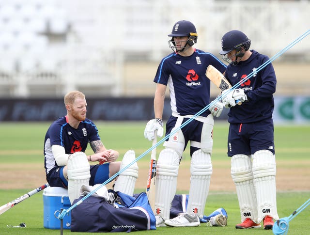 Ben Stokes, left, and Chris Woakes, centre
