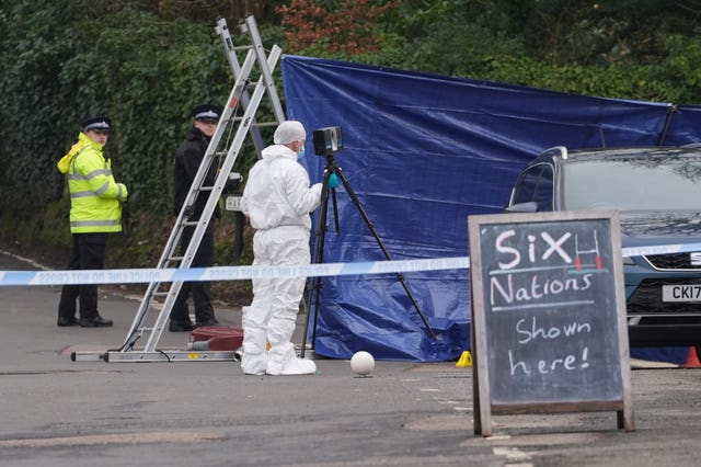 A forensic officer at work 