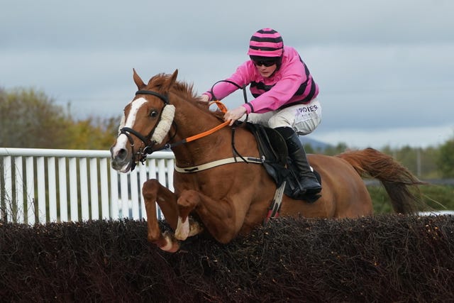 Now Where or When ridden by jockey Sam Ewing on their way to winning the Start Your Free Trial Now at racingtv.com Handicap Chase at Down Royal 