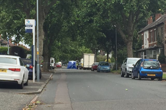 A blue forensics tent marking the spot where James Teer was shot dead