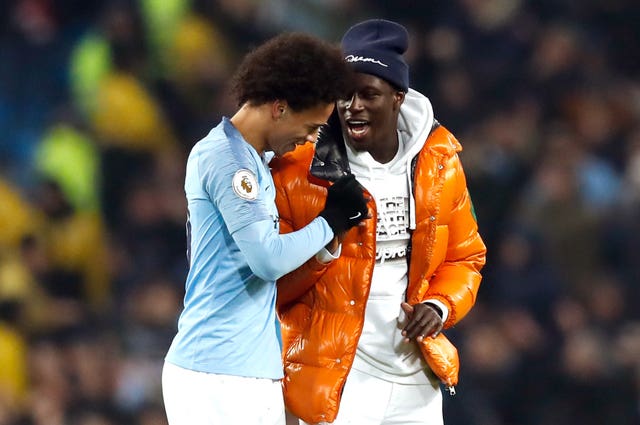 Benjamin Mendy, right, has been sidelined for long spells of the season