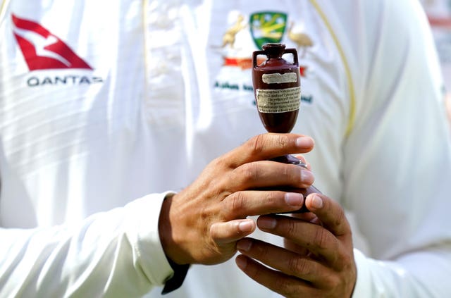 The Ashes urn in Australian hands