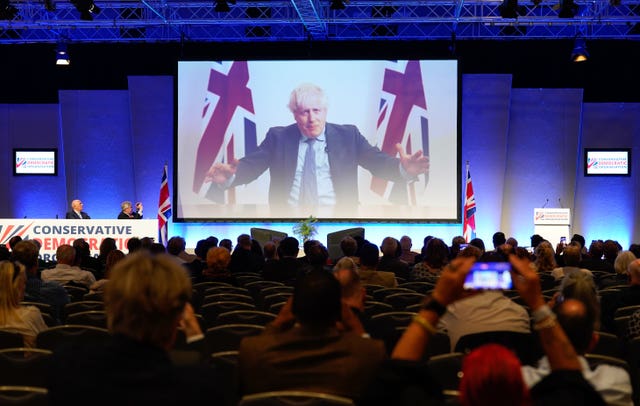 A video message from Boris Johnson is played during the Conservative Democratic Organisation conference at Bournemouth International Centre
